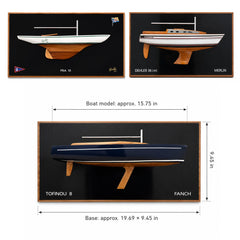 Bespoke wooden half-hull sailboat model, approx. 15.75 in, mounted on a 19.69 x 9.45 in plaque