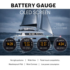 Marine OLED battery monitor installed on a sailing catamaran dashboard showing high-contrast visibility in bright daylight conditions.